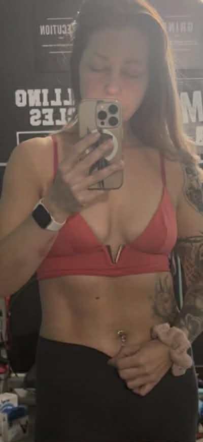 Lisa posing after a workout